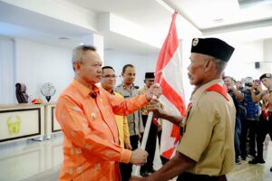 BUPATI SIGI LEPAS KONTINGEN PERAN SAKA NASIONAL KWARTIR CABANG SIGI MENUJU GORONTALO